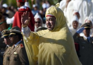 Moroccan King Mohammed VI waves to the crowd last year to mark 15 year in power (AFP)
