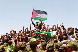 Indigenous Sahrawi people react during the funeral of Western Sahara's Polisario Front leader Mohamed Abdelaziz in Tindouf